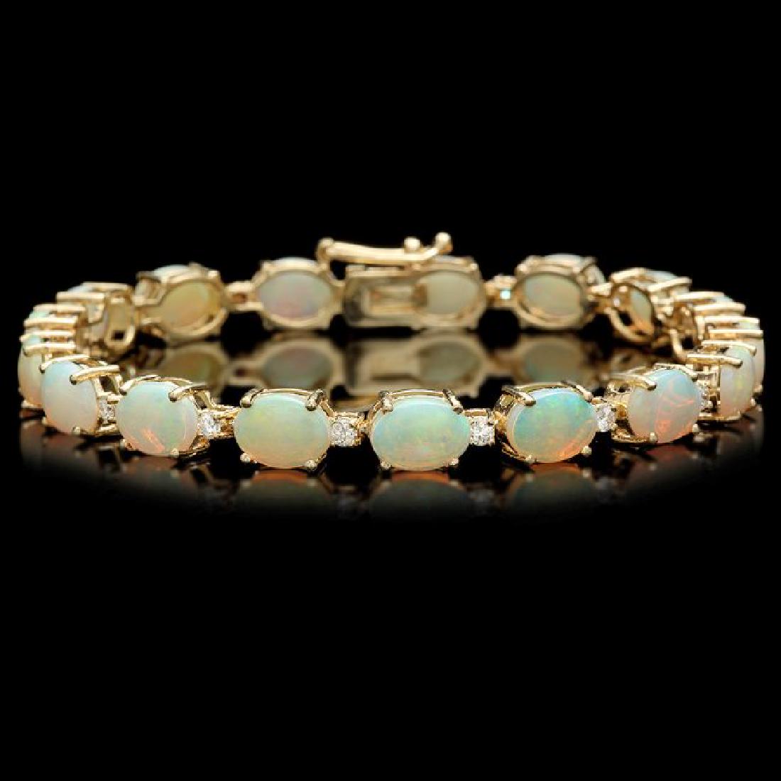 14k Gold 15.00ct Opal 0.75ct Diamond Bracelet: Retail: $21,500.00 ****** 14k Gold 15.00ct Opal 0.75ct Diamond Bracelet ****** Metal: 14k Solid Yellow Gold / Size: 7 / Total Item Weight: 12.0 grams / Country Made: United States / / Main Stone: Opal
