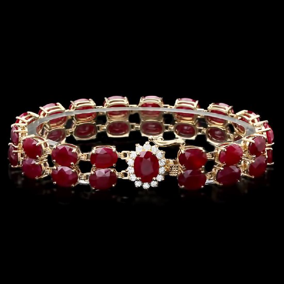 14k Gold 53.00ct Ruby 0.50ct Diamond Bracelet: Retail: $28,400.00 ****** 14k Gold 53.00ct Ruby 0.50ct Diamond Bracelet ****** Metal: 14k Solid Yellow Gold / Size: 7.5 / Total Item Weight: 28 grams / Country Made: United States / / Main Stone: Ruby
