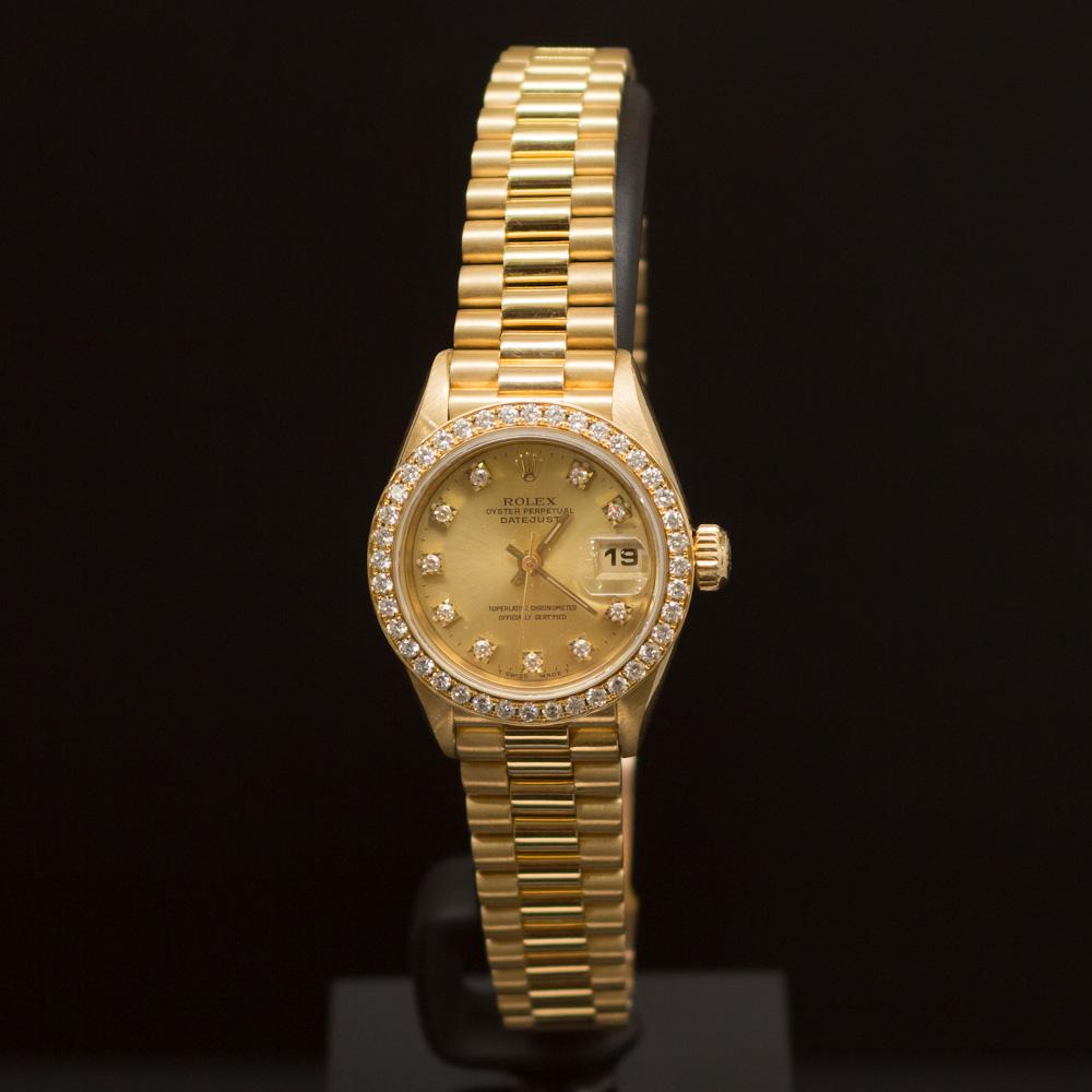 Rolex 18K Gold Presidential 26mm Diamond Dial Diamond: ****** Rolex 18K Gold Presidential 26mm Diamond Dial Diamond Bezel Women's Wristwatch ****** One Women's, Rolex 18K Gold Presidential 26mm electronically tested and polished. Case: Gold, 26mm. Bezel: 
