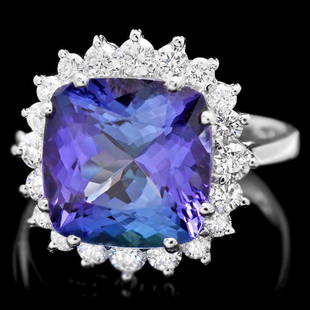 14k Gold 5.50ct Tanzanite 0.80ct Diamond Ring: Retail: $14,800.00 ****** 14k Gold 5.50ct Tanzanite 0.80ct Diamond Ring ****** Metal: 14k Solid White Gold / Size: 6.75 / Total Item Weight: 5.0 grams / Country Made: United States / / Main Stone: