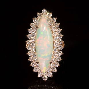 14K Gold 5,33ct Opal 2.85ct Diamond Ring: Retail: $14,987.00****** 14K Gold Opal & Diamond Ring ****** Metal: 14K Solid Rose Gold / Total Item Weight: 13.8 grams / Country Made: United States / / Main Stone: Opal / Color: Play of Color /