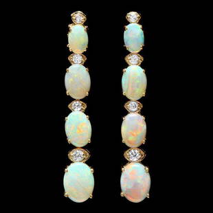 14k Gold 3.50ct Opal 0.35ct Diamond Earrings: Retail: $5,300.00 ****** 14k Gold 3.50ct Opal 0.35ct Diamond Earrings ****** Metal: 14k Solid Yellow Gold / Total Item Weight: 4.5 grams / Country Made: United States / / Main Stone: Opal / Color: