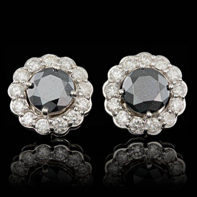 14k White Gold 6ct Diamond Earrings: Retail: $8,500.00 ****** 14k White Gold 6ct Diamond Earrings ****** Metal: 14k Solid White Gold / Total Item Weight: 5.0 grams / Country Made: United States / / Main Stone: Diamond / Color: Black / Ca