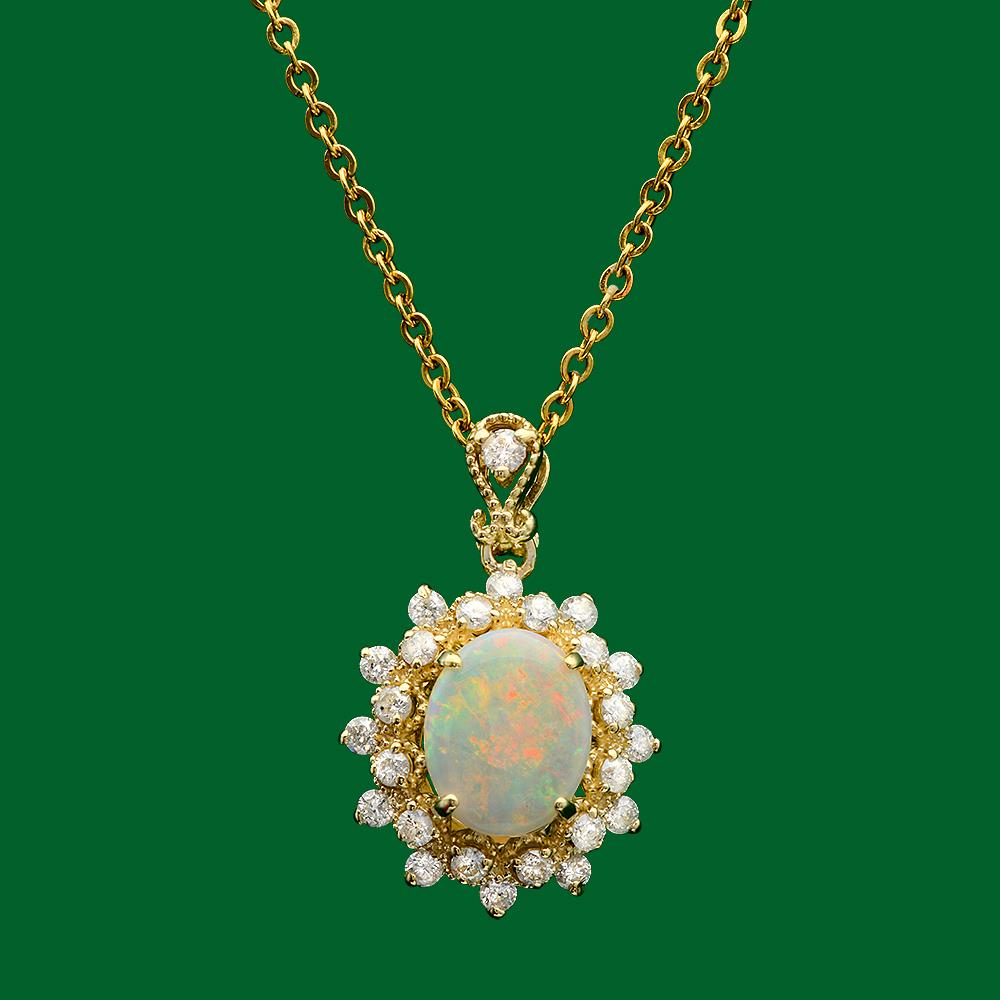 14k Gold 1.01ct Opal 0.70ct Diamond Pendant: Retail: $3,400.00 ****** 14k Gold 1.01ct Opal 0.70ct Diamond Pendant****** Metal: 14k Solid Yellow Gold / Total Item Weight: 2.7 grams / Country Made: United States / / Main Stone: Opal / Color: Play