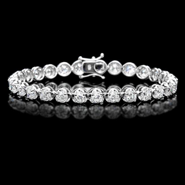 18k White Gold 10.00ct Diamond Tennis Bracelet: Retail: $42,400.00 ****** 18k White Gold 10.00ct Diamond Tennis Bracelet ****** Metal: 18k Solid White Gold / Size: 7 / Total Item Weight: 15.5 grams / Country Made: United States / / Main Stone: Diam