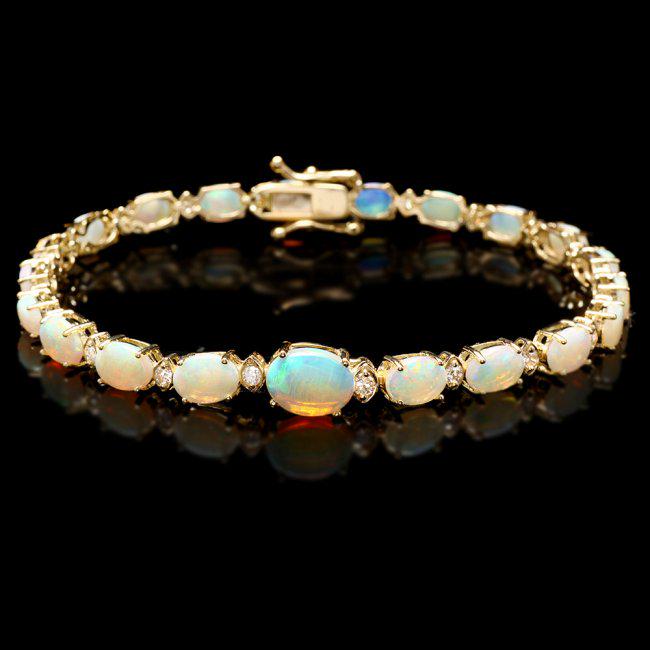 14k Gold 7.00ct Opal 0.50ct Diamond Bracelet: Retail: $9,500.00 ****** 14k Gold 7.00ct Opal 0.50ct Diamond Bracelet ****** Metal: 14k Solid Yellow Gold / Size: 7.5 / Total Item Weight: 9.5 grams / Country Made: United States / / Main Stone: Opal 