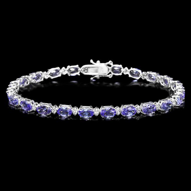14k Gold 10ct Tanzanite 0.60ct Diamond Bracelet: Retail: $8,500.00 ****** 14k Gold 10ct Tanzanite 0.60ct Diamond Bracelet ****** Metal: 14k Solid White Gold / Size: 7 / Total Item Weight: 8.5 grams / Country Made: United States / / Main Stone: Tanza