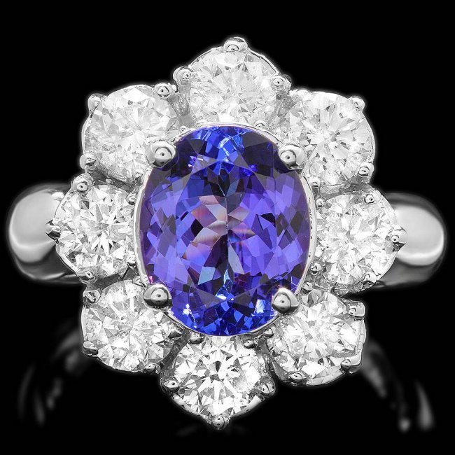 14k Gold 3.00ct Tanzanite 2.50ct Diamond Ring: Retail: $12,700.00 ****** 14k Gold 3.00ct Tanzanite 2.50ct Diamond Ring ****** Metal: 14k Solid White Gold / Size: 6.5 / Total Item Weight: 8.0 grams / / Main Stone: Tanzanite / Color: Purple / Carat 