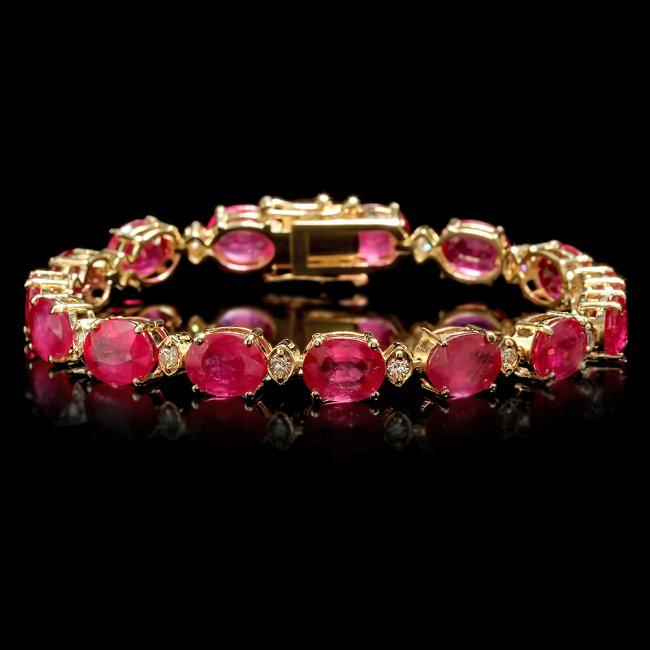 14k Gold 35.00ct Ruby 1.15ct Diamond Bracelet: Retail: $17,400.00 ****** 14k Gold 35.00ct Ruby 1.15ct Diamond Bracelet ****** Metal: 14k Solid Yellow Gold / Size: 7 / Total Item Weight: 23.0 grams / Country Made: United States / / Main Stone: Ruby