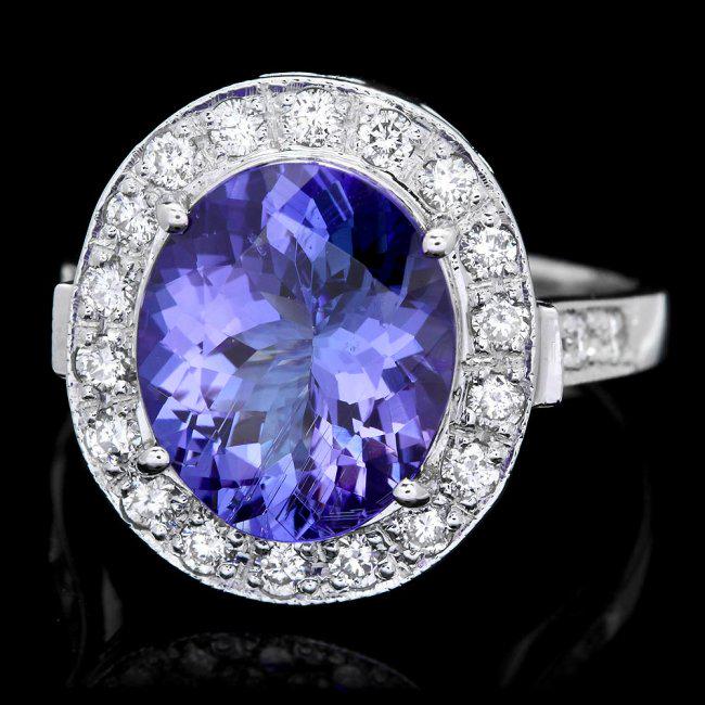 14k Gold 5.00ct Tanzanite 0.70ct Diamond Ring: Retail: $13,500.00 ****** 14k Gold 5.00ct Tanzanite 0.70ct Diamond Ring ****** Metal: 14k Solid White Gold / Size: 7.5 / Total Item Weight: 6.5 grams / Country Made: United States / / Main Stone: Tanz