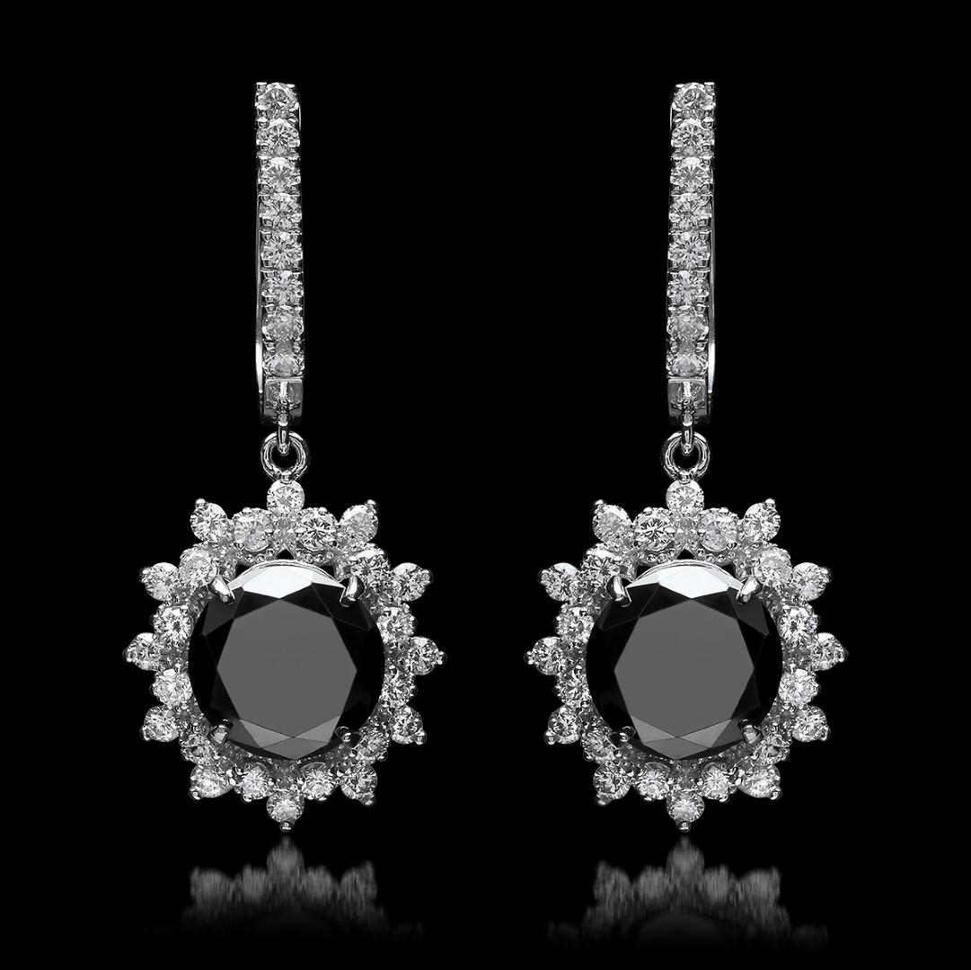 14K White Gold, 9.65cts Diamond Earrings: Retail: $23,897.00****** 14K White Gold, 8.00cts. Black Diamond & 9.65cts.Diamond Earrings******* Metal: 14K White Gold/ Total Wt.: 7g/ Country Made USA/ Main Stone: Black Diamond/ Adjacent Stone: Dia