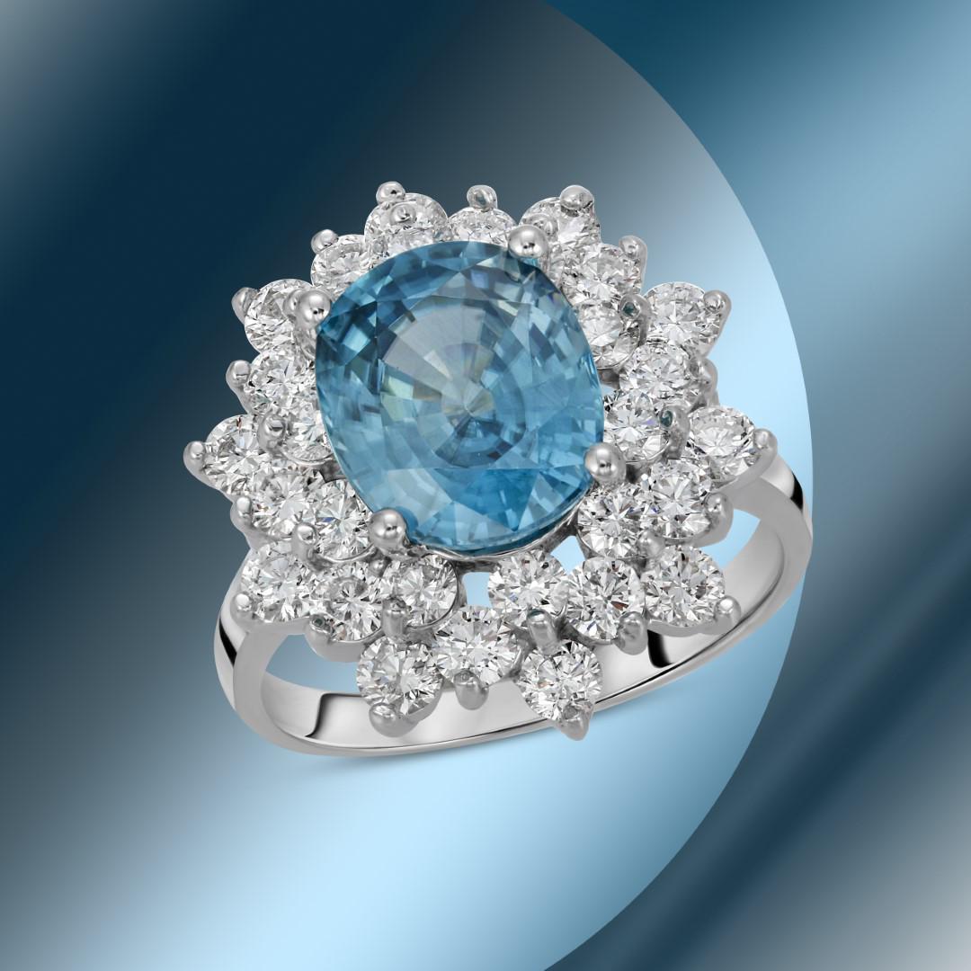 14K Gold 6.44cts Blue Zircon & 1.71cts Diamond Ring: Retail: $9,732***** 14K Gold 6.44cts Blue Zircon & 1.71cts Diamond Ring****** Metal: 14K White Gold/ Total Wt.: 6.6g/ Country Made USA// Main Stone: Zircon/ Carat Total Wt: 6.44cts / Treatment: None/ 