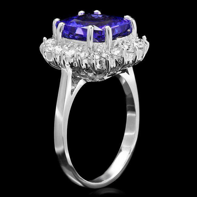14k Gold 4.00ct Tanzanite 0.90ct Diamond Ring: Retail: $11,850.00 ****** 14k Gold 4.00ct Tanzanite 0.90ct Diamond Ring ****** Metal: 14k Solid White Gold / Size: 7 / Total Item Weight: 5.5 grams / Country Made: United States / / Main Stone: Tanzan