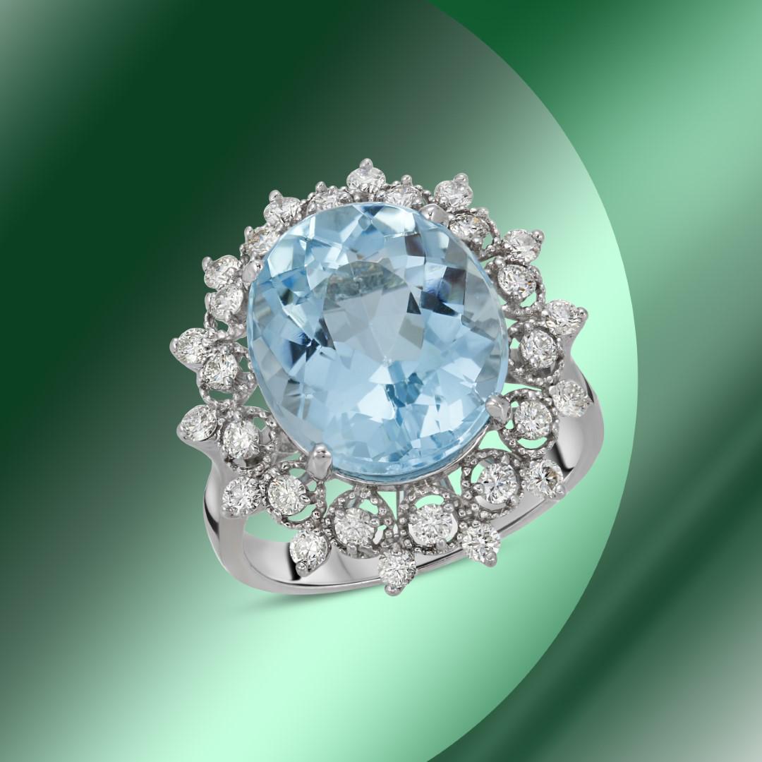 14K Gold 9.51cts Blue Topaz & 0.88cts Diamond Ring: Retail: $5,000***** 14K Gold 9.51cts Blue Topaz & 0.88cts Diamond Ring****** Metal: 14K White Gold/ Total Wt.: 6.6g/ Country Made USA// Main Stone: Topaz/ Carat Total Wt: 9.51cts / Treatment: Color En