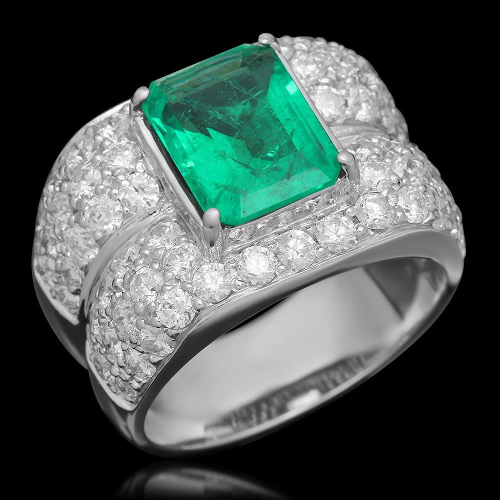 14K Gold 3.45 Emerald 3.68 Diamond Ring: Retail: $25,406.00 ******14K Gold 3.45 Emerald 3.68 Diamond Ring****** Metal: 14K Solid Gold / Total Item Weight: 14.2 grams / Country Made: United States / / Main Stone: Emerald / Color: Green / Cara