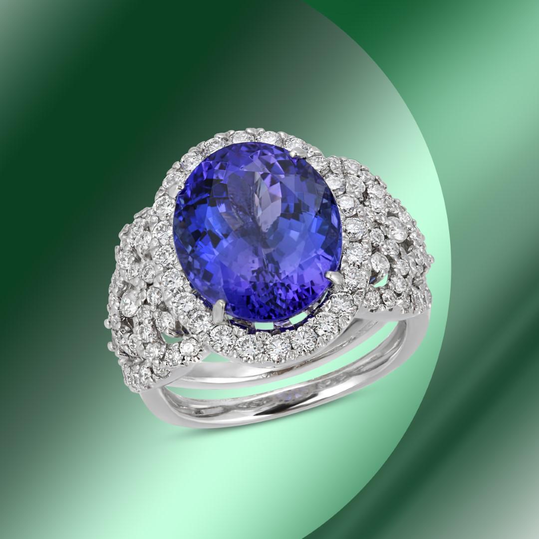14K Gold 6.70cts Tanzanite & 1.85cts Diamond Ring: Retail: $22,360***** 14K Gold 6.70cts Tanzanite & 1.85cts Diamond Ring****** Metal: 14K White Gold/ Total Wt.: 9.5g/ Country Made USA// Main Stone: Tanzanite/ Carat Total Wt: 6.70cts / Treatment: None