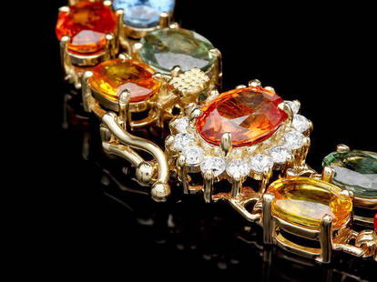 14k Gold 37ct Sapphire 0.45ct Diamond Bracelet: Retail: $16,800.00 ****** 14k Gold 37ct Sapphire 0.45ct Diamond Bracelet ****** Metal: 14k Solid Yellow Gold / Size: 7 / Total Item Weight: 25 grams / Country Made: United States / / Main Stone: