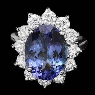 14k Gold 6.50ct Tanzanite 2.00ct Diamond Ring: Retail: $18,600.00 ****** 14k Gold 6.50ct Tanzanite 2.00ct Diamond Ring ****** Metal: 14k Solid White Gold / Size: 7 / Total Item Weight: 6.5 grams / Country Made: United States / / Main Stone: