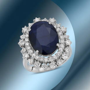 14K Gold 7.11cts Sapphire & 1.39cts Diamond Ring: Retail: $9,780***** 14K Gold 7.11cts Sapphire & 1.39cts Diamond Ring****** Metal: 14K White Gold/ Total Wt.: 8.2g/ Country Made USA// Main Stone: Sapphire/ Carat Total Wt: 7.11cts / Treatment: