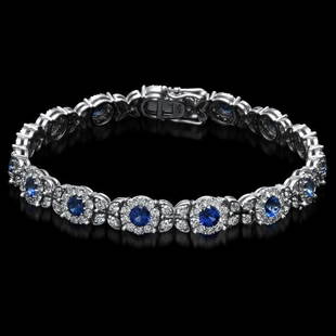 14K Gold 5.69ct Sapphire 3.88ct Diamond Bracelet: Retail: $13,360.00******14K Gold 5.69ct Sapphire 3.88ct Diamond Bracelet****** Metal: 14K Solid White Gold / Total Item Weight: 13.3 grams / Country Made: United States / / Main Stone: Sapphire /