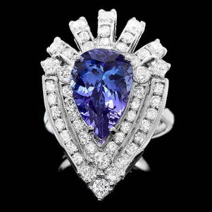 14k Gold 4.50ct Tanzanite 2.30ct Diamond Ring: Retail: $18,300.00 ****** 14k Gold 4.50ct Tanzanite 2.30ct Diamond Ring ****** Metal: 14k Solid White Gold / Size: 7 / Total Item Weight: 9.0 grams / Country Made: United States / / Main Stone: