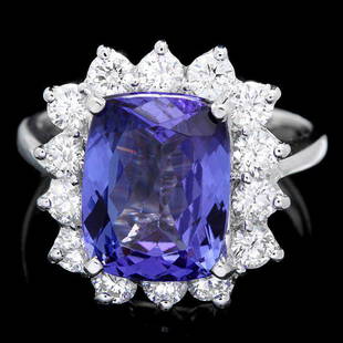 14k Gold 5.00ct Tanzanite 1.20ct Diamond Ring: Retail: $12,100.00 ****** 14k Gold 5.00ct Tanzanite 1.20ct Diamond Ring ****** Metal: 14k Solid White Gold / Size: 7 / Total Item Weight: 6.5 grams / Country Made: United States / / Main Stone: