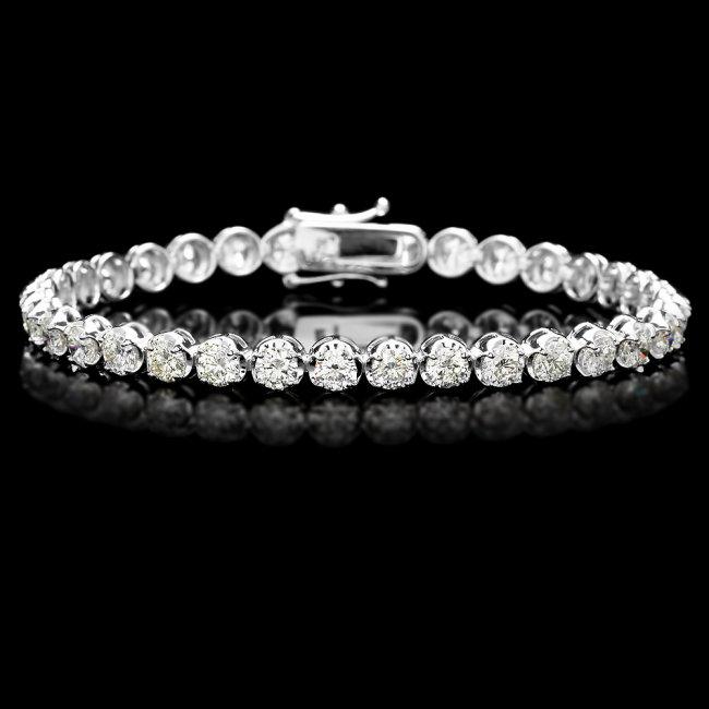 18k White Gold 9.00ct Diamond Tennis Bracelet: Retail: $38,100.00 ****** 18k White Gold 9.00ct Diamond Tennis Bracelet ****** Metal: 18k Solid White Gold / Size: 7.5 / Total Item Weight: 14.0 grams / Country Made: United States / / Main Stone: Dia