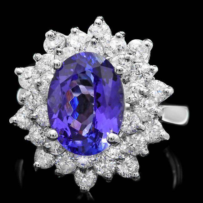 14k Gold 3.50ct Tanzanite 1.70ct Diamond Ring: Retail: $11,400.00 ****** 14k Gold 3.50ct Tanzanite 1.70ct Diamond Ring ****** Metal: 14k Solid White Gold / Size: 7.25 / Total Item Weight: 6.0 grams / Country Made: United States / / Main Stone: Tan