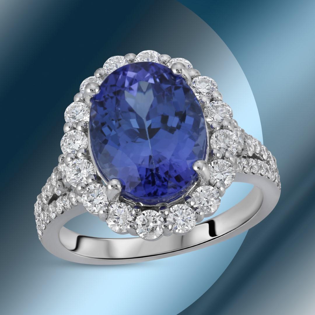 14K Gold 5.60cts Tanzanite & 1.22cts Diamond Ring: Retail: $23,658*****. 14K Gold 5.60cts Tanzanite & 1.22cts Diamond Ring****** Metal: 14K White Gold/ Total Wt.: 6.5g / Country Made USA// Main Stone: Tanzanite / Carat Total Wt: 5.60cts / Treatment: N