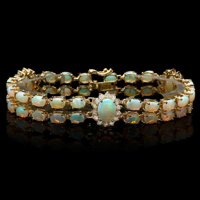 14k Gold 12.5ct Opal 1.75ct Diamond Bracelet: Retail: $24,850.00 ****** 14k Gold 12.5ct Opal 1.75ct Diamond Bracelet ****** Metal: 14k Solid Yellow Gold / Size: 7 / Total Item Weight: 18.5 grams / Country Made: United States / / Main Stone: Opal 