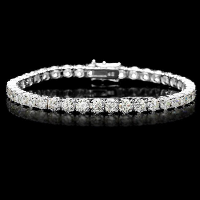 18k White Gold 13.00ct Diamond Tennis Bracelet: Retail: $53,800.00 ****** 18k White Gold 13.00ct Diamond Tennis Bracelet ****** Metal: 18k Solid White Gold / Size: 7 / Total Item Weight: 15.5 grams / Country Made: United States / / Main Stone: Diam
