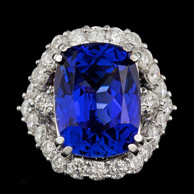 18k Gold 16.00ct Tanzanite 2.60ct Diamond Ring: Retail: $48,500.00 ****** 18k Gold 16.00ct Tanzanite 2.60ct Diamond Ring ****** Metal: 18k Solid White Gold / Size: 7 / Total Item Weight: 11.3 grams / Country Made: United States / / Main Stone: Tanz
