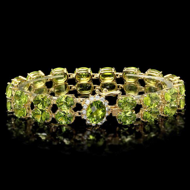 14k Gold 45ct Peridot 0.50ct Diamond Bracelet: Retail: $15,800.00 ****** 14k Gold 45ct Peridot 0.50ct Diamond Bracelet ****** Metal: 14k Solid Yellow Gold / Size: 7.25 / Total Item Weight: 25 grams / Country Made: United States / / Main Stone: Per