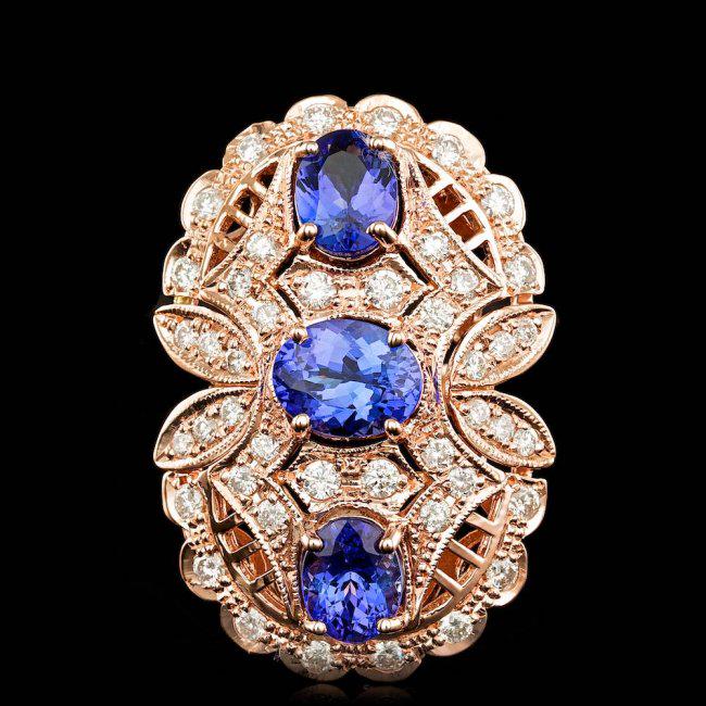 14k Rose 5.50ct Tanzanite 1.60ct Diamond Ring: Retail: $13,100.00 ****** 14k Rose 5.50ct Tanzanite 1.60ct Diamond Ring ****** Metal: 14k Solid Rose Gold / Size: 7.5 / Total Item Weight: 13.5 grams / Country Made: United States / / Main Stone: Tanz