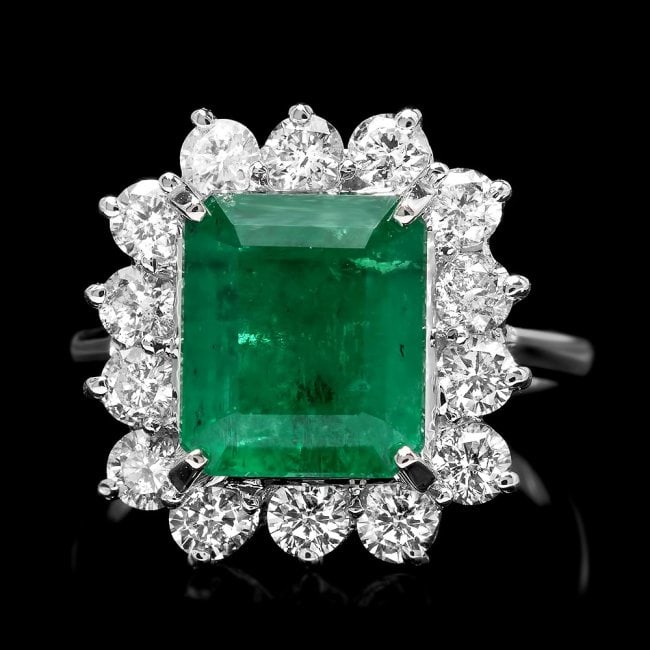 18k White Gold 4.00ct Emerald 1.30ct Diamond Ring: Retail: $15,600.00 ****** 18k White Gold 4.00ct Emerald 1.30ct Diamond Ring ****** Metal: 18k Solid White Gold / Size: 7 / Total Item Weight: 7.0 grams / Country Made: United States / / Main Stone: Em