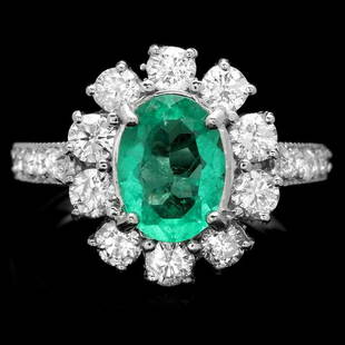 14k White Gold 1.50ct Emerald 1.45ct Diamond Ring: Retail: $13,700.00 ****** 14k White Gold 1.50ct Emerald 1.45ct Diamond Ring ****** Metal: 14k Solid White Gold / Size: 7.25 / Total Item Weight: 5.5 grams / / Main Stone: Emerald / Color: Green /