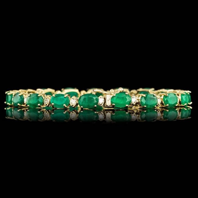 14k Gold 14.00ct Emerald 1.00ct Diamond Bracelet: Retail: $14,800.00 ****** 14k Gold 14.00ct Emerald 1.00ct Diamond Bracelet ****** Metal: 14k Solid Yellow Gold / Size: 7 / Total Item Weight: 10.0 grams / Country Made: United States / / Main Stone: E