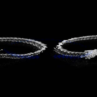 14K Gold 7.11ct Sapphire 0.57ct Diamond Bracelet: Retail: $6,855.00******14K Gold Sapphire & Diamond Bracelet ****** Metal: 14K Solid White Gold / Total Item Weight: 10.0 grams / Country Made: United States / / Main Stone: Sapphire / Color: Blue /