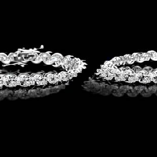 18k White Gold 10.00ct Diamond Tennis Bracelet: Retail: $42,400.00 ****** 18k White Gold 10.00ct Diamond Tennis Bracelet ****** Metal: 18k Solid White Gold / Size: 7 / Total Item Weight: 15.5 grams / Country Made: United States / / Main Stone: