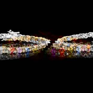 14k Gold 11ct Sapphire 1.4ct Diamond Bracelet: Retail: $14,750.00 ****** 14k Gold 11ct Sapphire 1.4ct Diamond Bracelet ****** Metal: 14k Solid Yellow Gold / Size: 7 / Total Item Weight: 13.0 grams / Country Made: United States / / Main Stone: