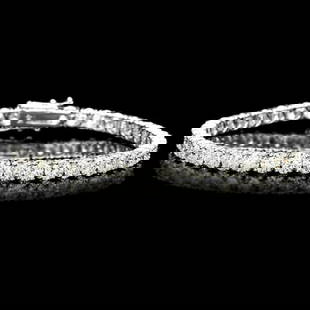 18k White Gold 12.00ct Diamond Tennis Bracelet: Retail: $49,600.00 ****** 18k White Gold 12.00ct Diamond Tennis Bracelet ****** Metal: 18k Solid White Gold / Size: 7.5 / Total Item Weight: 14.0 grams / Country Made: United States / / Main Stone: Di