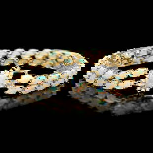 14k Yellow Gold 13ct Opal 0.55ct Diamond Bracelet: Retail: $12,750.00 ****** 14k Yellow Gold 13ct Opal 0.55ct Diamond Bracelet ****** Metal: 14k Solid Yellow Gold / Size: 7 / Total Item Weight: 17.0 grams / Country Made: United States / / Main Stone: