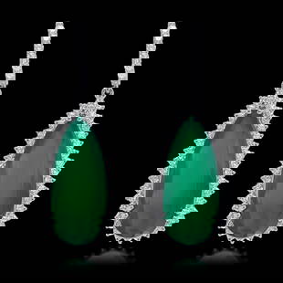 14K White Gold, 25.50cts Chalcedony & 2.91cts. Diamond Earrings: Retail: $37,990.00****** 14K White Gold,25.50cts. Chalcedony & 2.91cts.Diamond Earrings******* Metal: 14K White Gold/ Total Wt.: 20.0g/ Country Made USA/ Main Stone: Chalcedony/ Adjacent Stone: