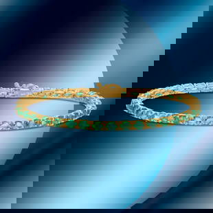 14K Gold 6.89cts Emerald Bracelet: Retail: $10,870*****14K Gold Emerald Bracelet*****Metal: 14K Yellow Gold/ Total Wt.: 10.4g / Country Made US// Main Stone: Emerald / Carat Total Wt.: 6.89cts / Treatment: None/ Color: Green / Cut: