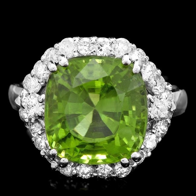 14k White Gold 7.50ct Peridot 1.20ct Diamond Ring: Retail: $11,800.00 ****** 14k White Gold 7.50ct Peridot 1.20ct Diamond Ring ****** Metal: 14k Solid White Gold / Size: 7 / Total Item Weight: 6.0 grams / Country Made: United States / / Main Stone: Pe