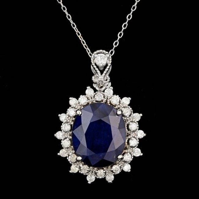 14k Gold 10.00ct Sapphire 0.80ct Diamond Pendant: Retail: $9,700.00 ****** 14k Gold 10.00ct Sapphire 0.80ct Diamond Pendant ****** Metal: 14k Solid White Gold / Size: 18 / Total Item Weight: 6.5 grams / Country Made: United States / / Main Stone: Sap