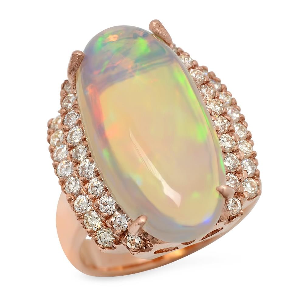 14K Gold 8.81ct Opal 1.10ct Diamond Ring: Retail: $10,870.00 ****** 14K Gold 8.81ct Opal 1.10ct Diamond Ring ****** Metal: 14K Solid Gold / Total Item Weight: 10.2 grams / Country Made: United States / / Main Stone: Opal / Color: Play of colo