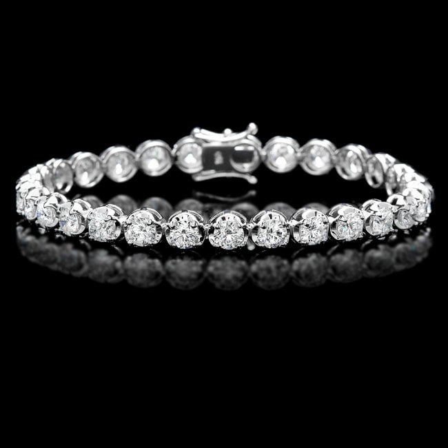 18k White Gold 9.50ct Diamond Tennis Bracelet: Retail: $40,500.00 ****** 18k White Gold 9.50ct Diamond Tennis Bracelet ****** Metal: 18k Solid White Gold / Size: 7 / Total Item Weight: 15.5 grams / Country Made: United States / / Main Stone: Diamo