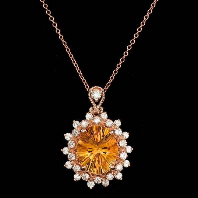 14k Gold 4.00ct Citrine 0.80ct Diamond Pendant: Retail: $5,700.00 ****** 14k Gold 4.00ct Citrine 0.80ct Diamond Pendant ****** Metal: 14k Solid Yellow Gold / Size: 18 / Total Item Weight: 5.0 grams / Country Made: United States / / Main Stone: Citr