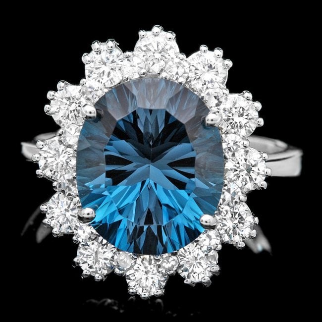 14k White Gold 5.70ct Topaz 0.80ct Diamond Ring: Retail: $7,800.00 ****** 14k White Gold 5.70ct Topaz 0.80ct Diamond Ring ****** Metal: 14k Solid White Gold / Size: 7 / Total Item Weight: 6.0 grams / Country Made: United States / / Main Stone: Topaz